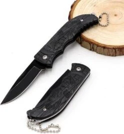 The Reaper Zakmes - Opvouwbaar - Discreet - Survival Mes - Tactical Knife - 16cm - Vlijmscherp - RVS - Zwart -Falke Shop 1107x1200